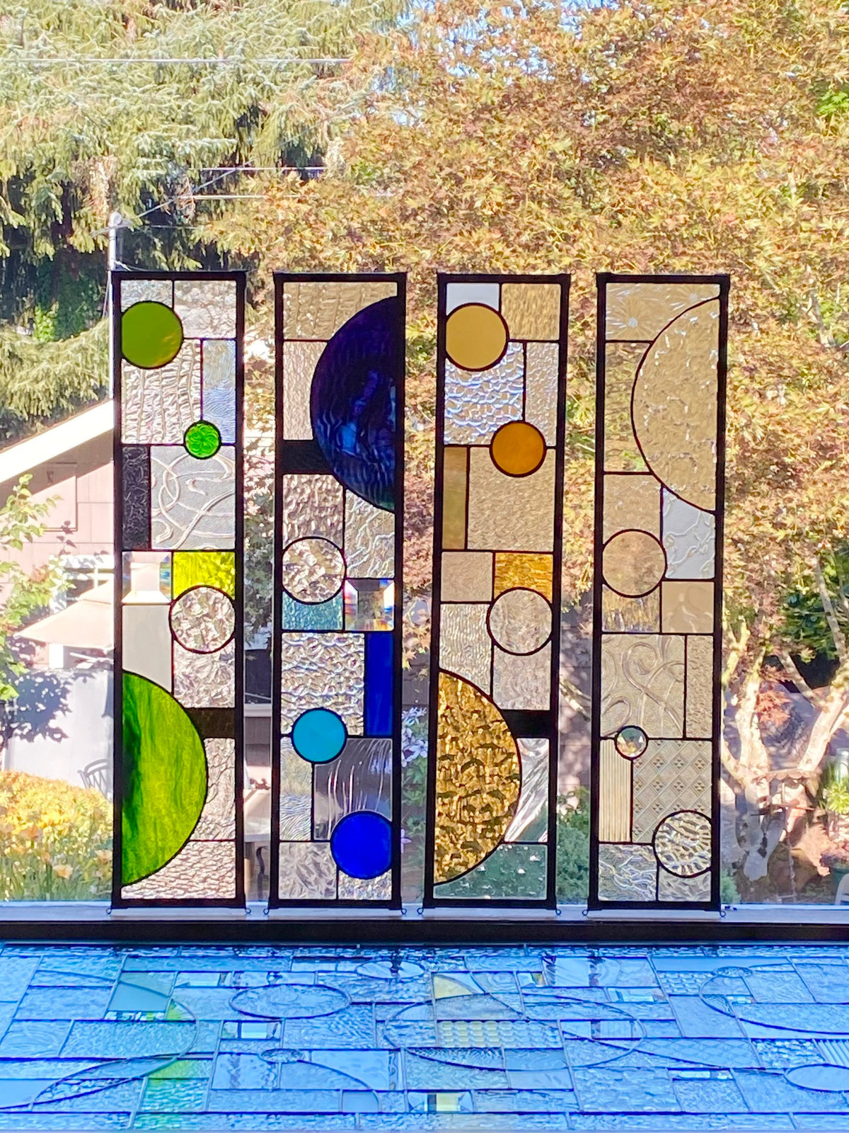 5" x 24" half circle abstract stained glass panel