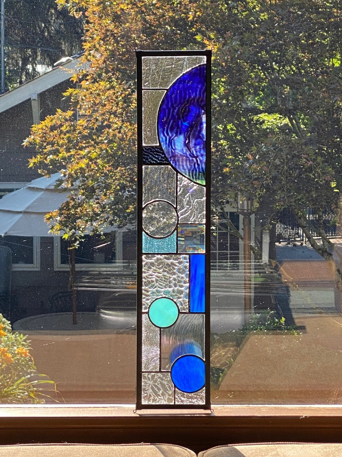 5" x 24" half circle abstract stained glass panel