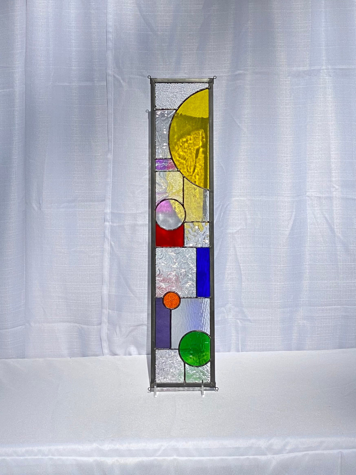 5" x 24" half circle abstract stained glass panel