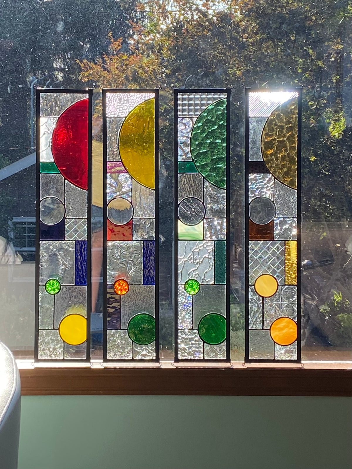 5" x 24" half circle abstract stained glass panel