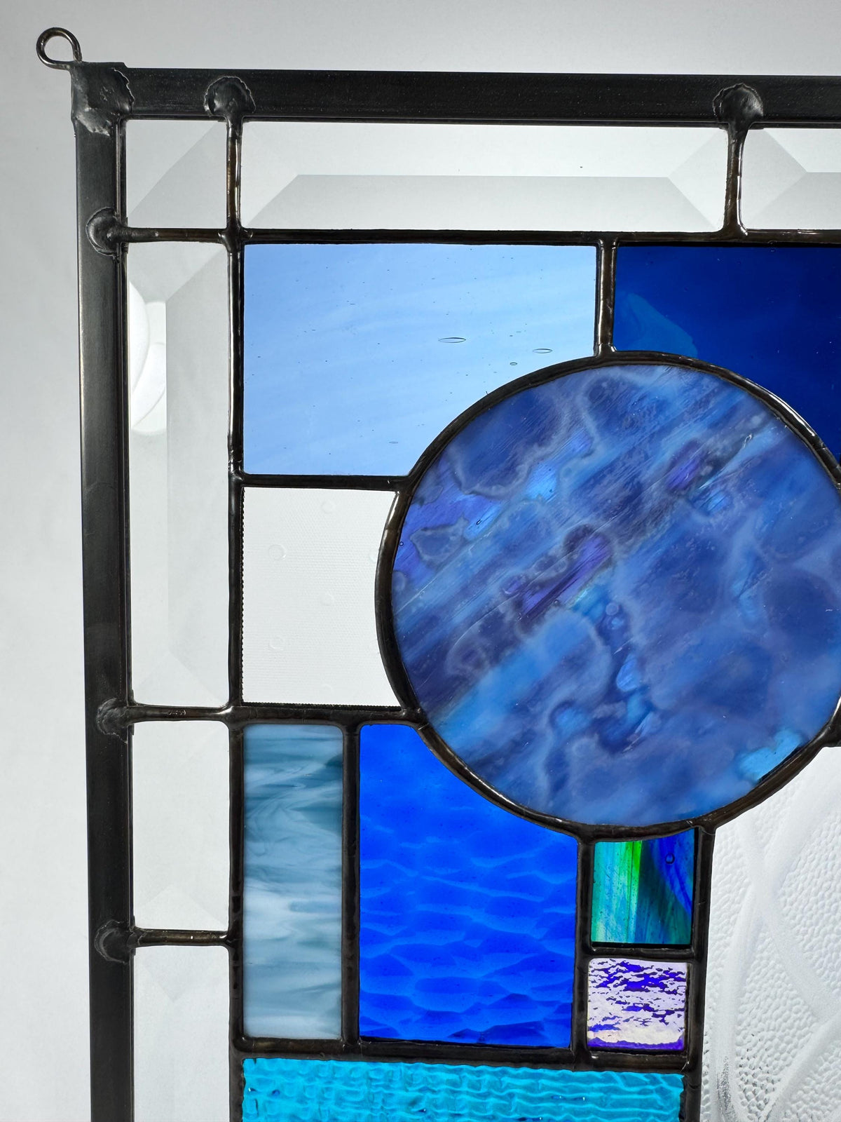 10.5" x 12.5" blue abstract stained glass panel