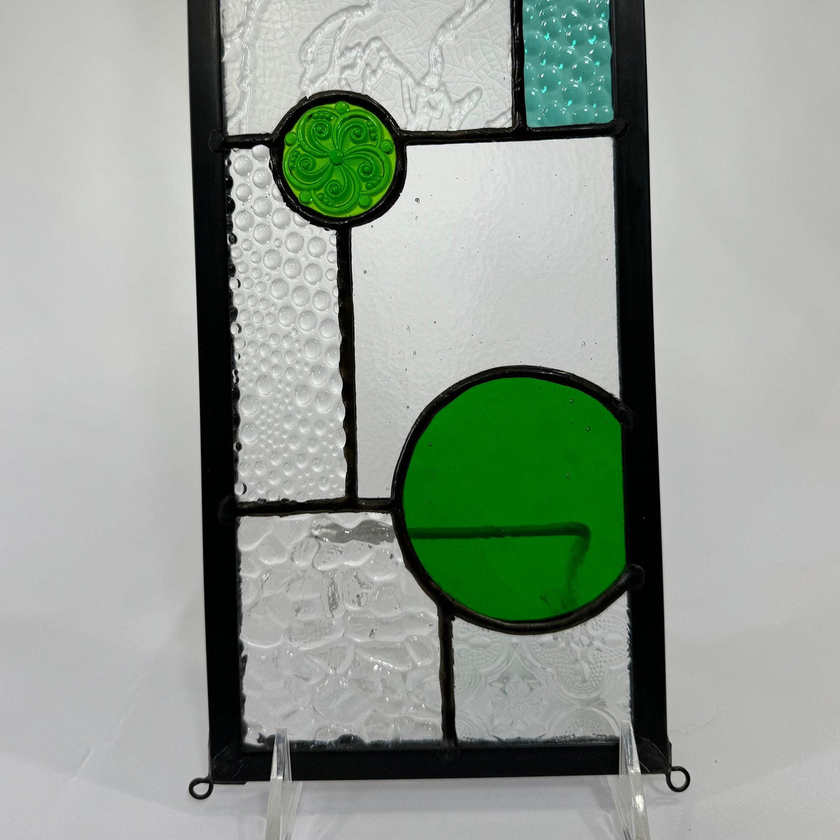 5" x 24" green half circle abstract stained glass panel