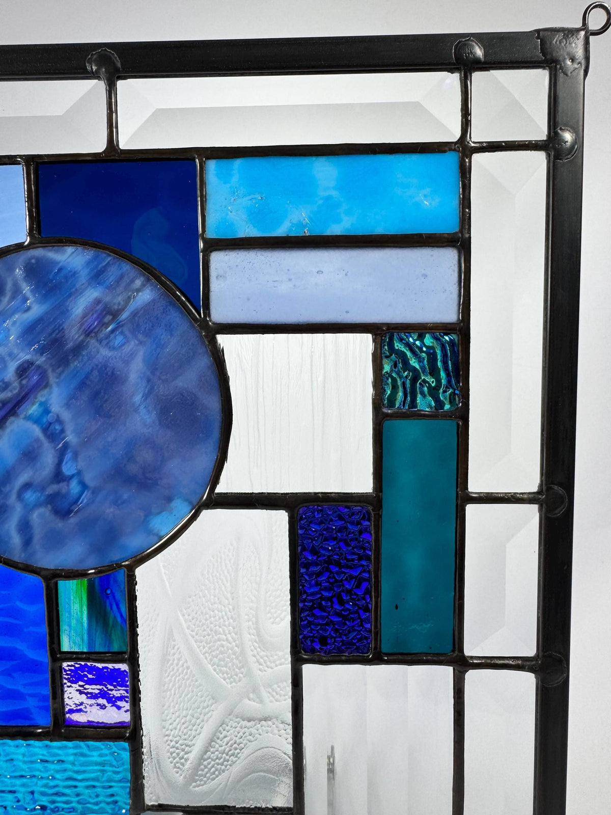10.5" x 12.5" blue abstract stained glass panel