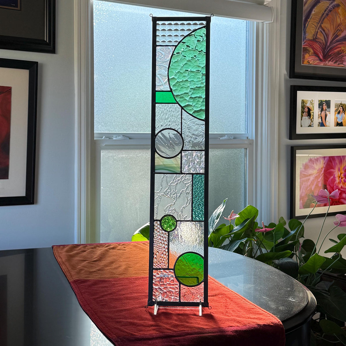 5" x 24" green half circle abstract stained glass panel