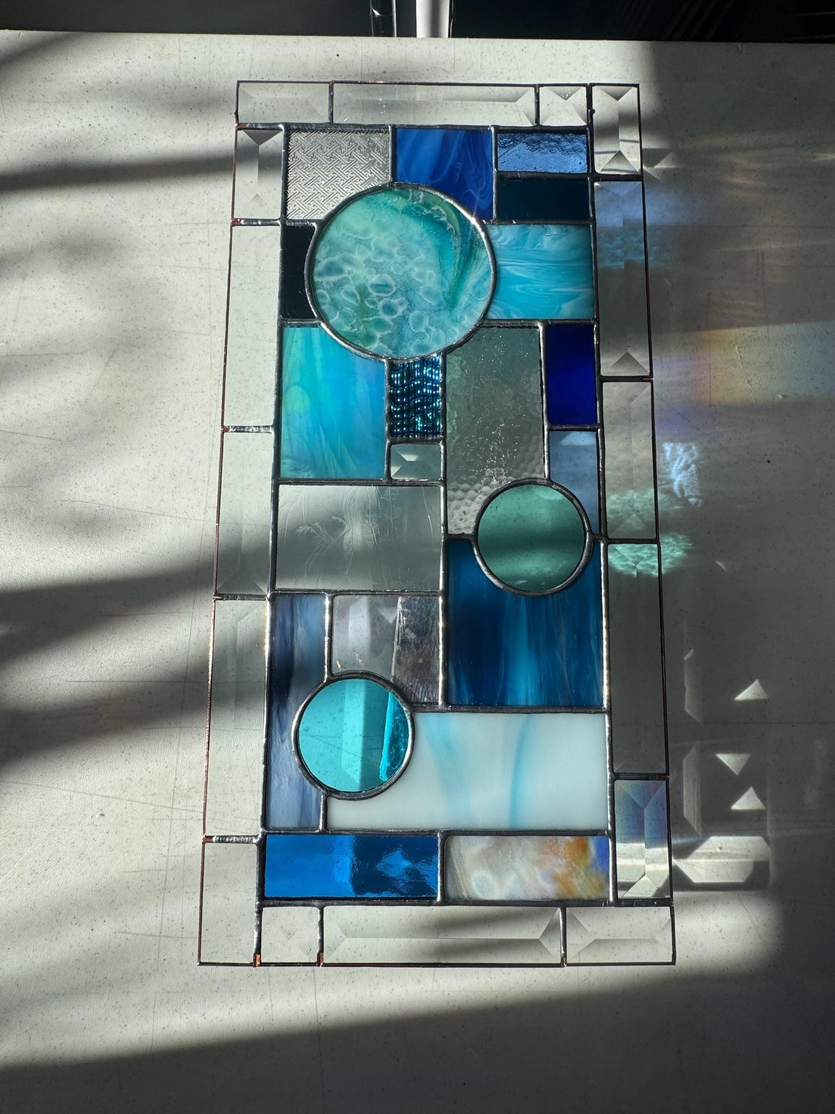 8.5" x 16.5" blue abstract stained glass panel